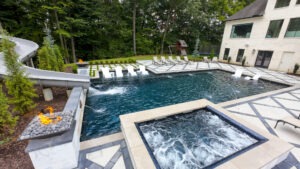 Custom pool installation with hot tub attached